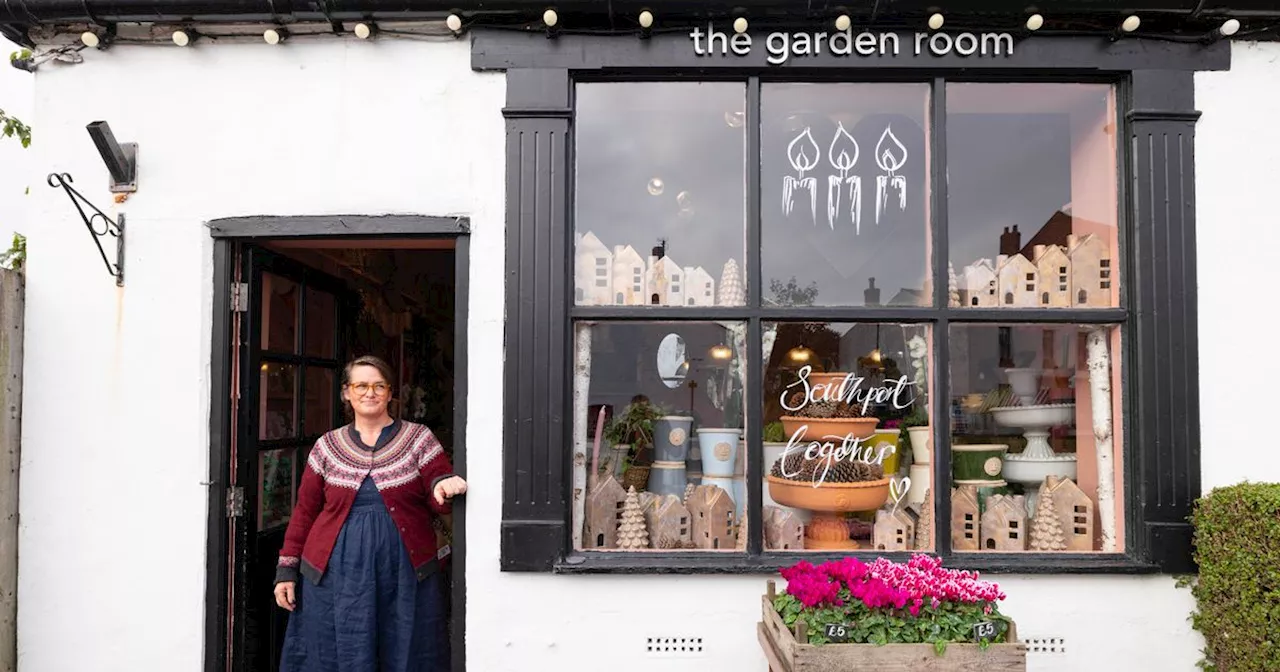 Inside the thriving village with thatched cottages and independent shops