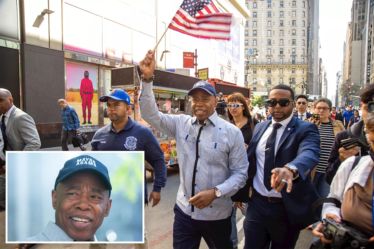 Indicted Mayor Eric Adams gets warm welcome at NYC events while deflecting federal probe questions: 'We love you!'