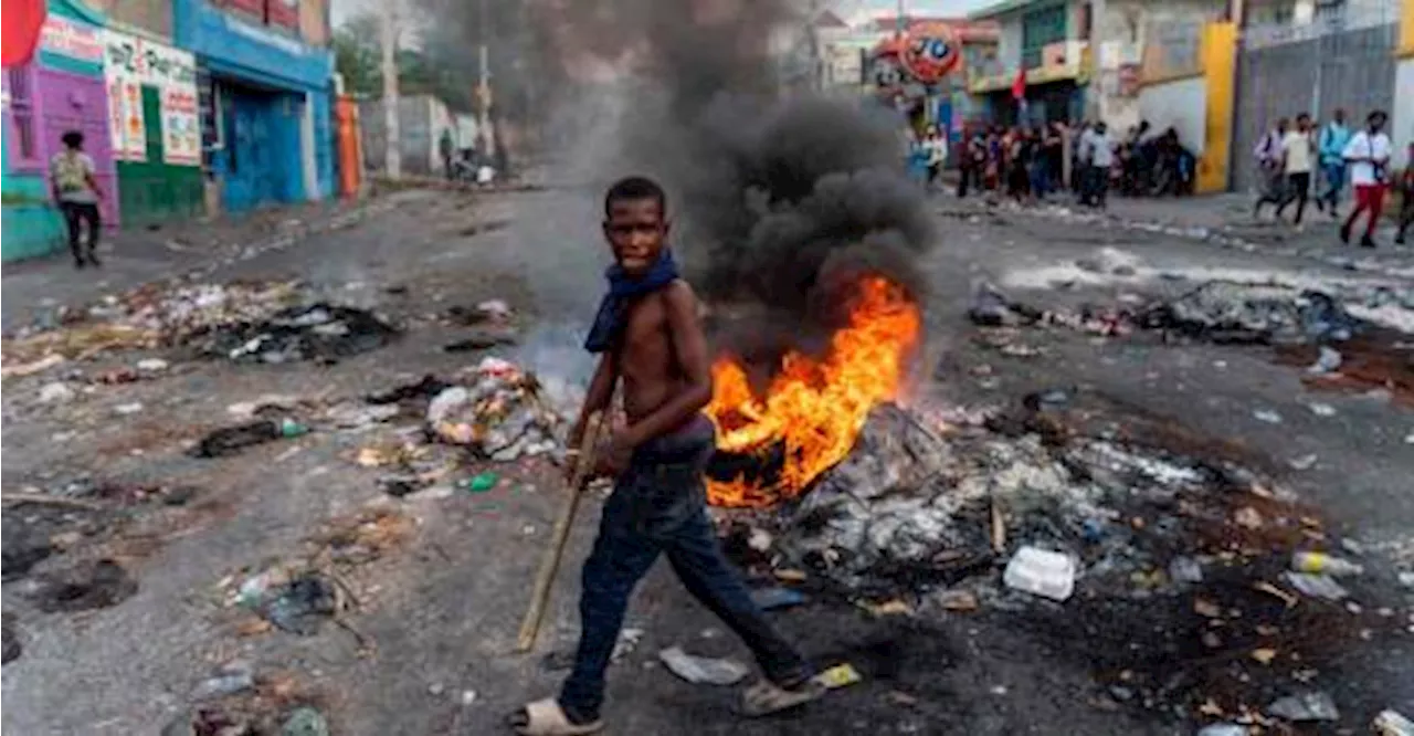 Haitian gang slaughters at least 70 people as thousands flee