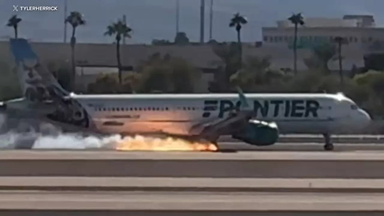 Frontier Airlines jet appears to catch fire while landing at Las Vegas airport; FAA investigating