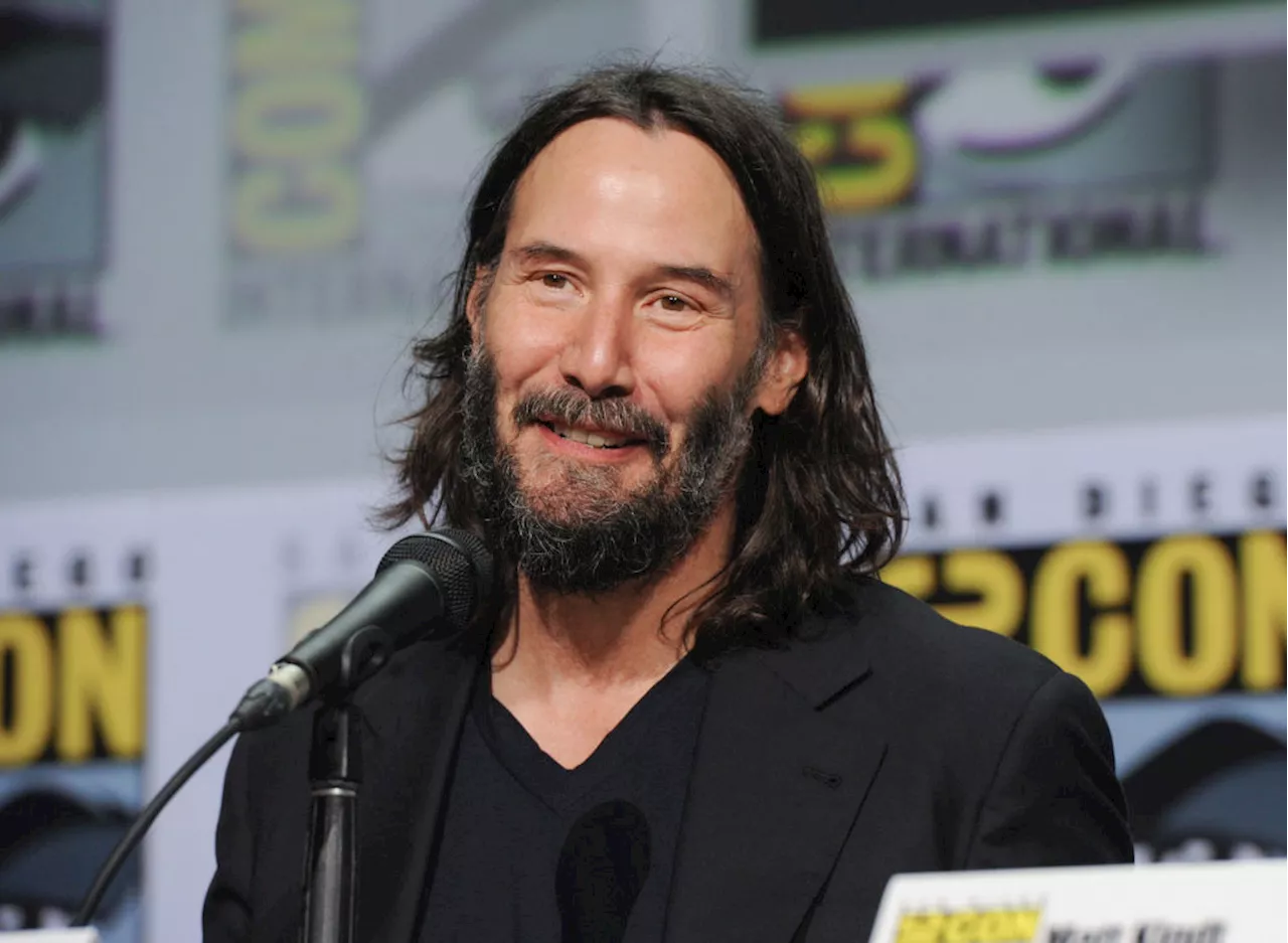 Keanu Reeves goes for a spin in pro racing debut at Indianapolis Motor Speedway