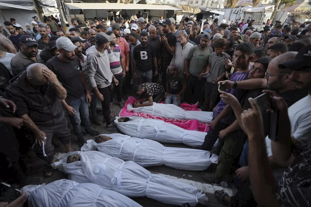 A strike on a mosque kills 19 as Israel bombards northern Gaza and southern Beirut