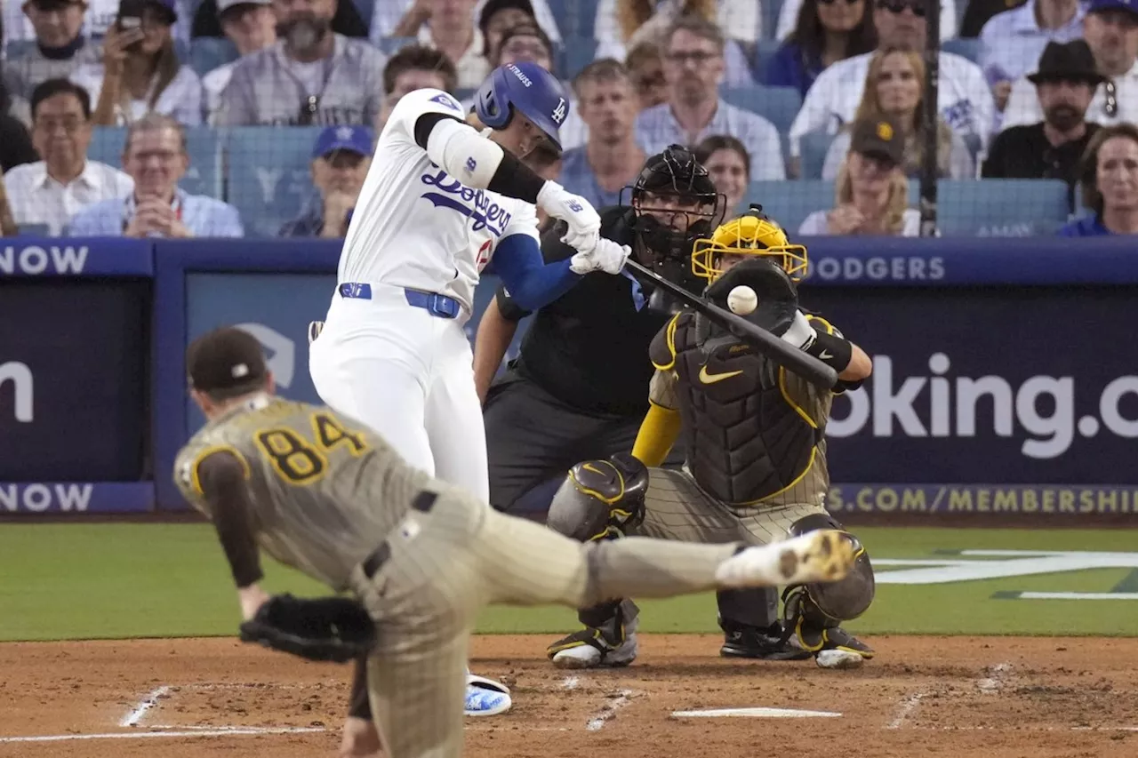 Ohtani homers in playoff debut, Dodgers rally to beat Padres 7-5