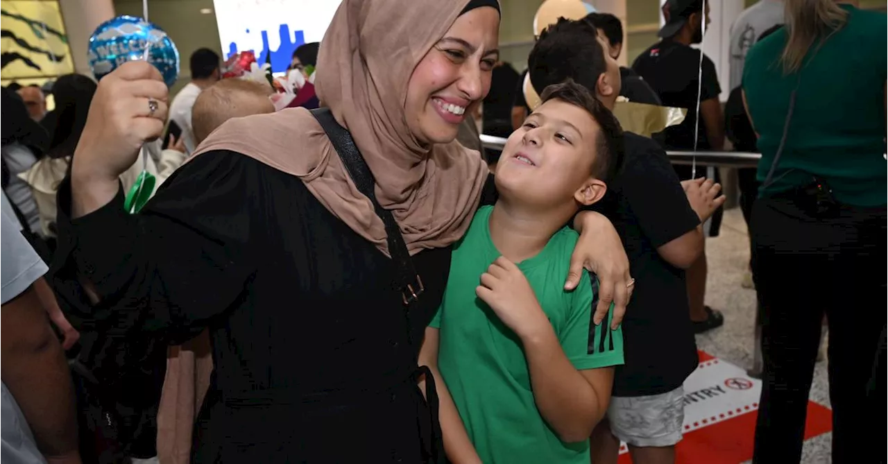 Joy as hundreds of Australians fleeing Lebanon touch down in Sydney