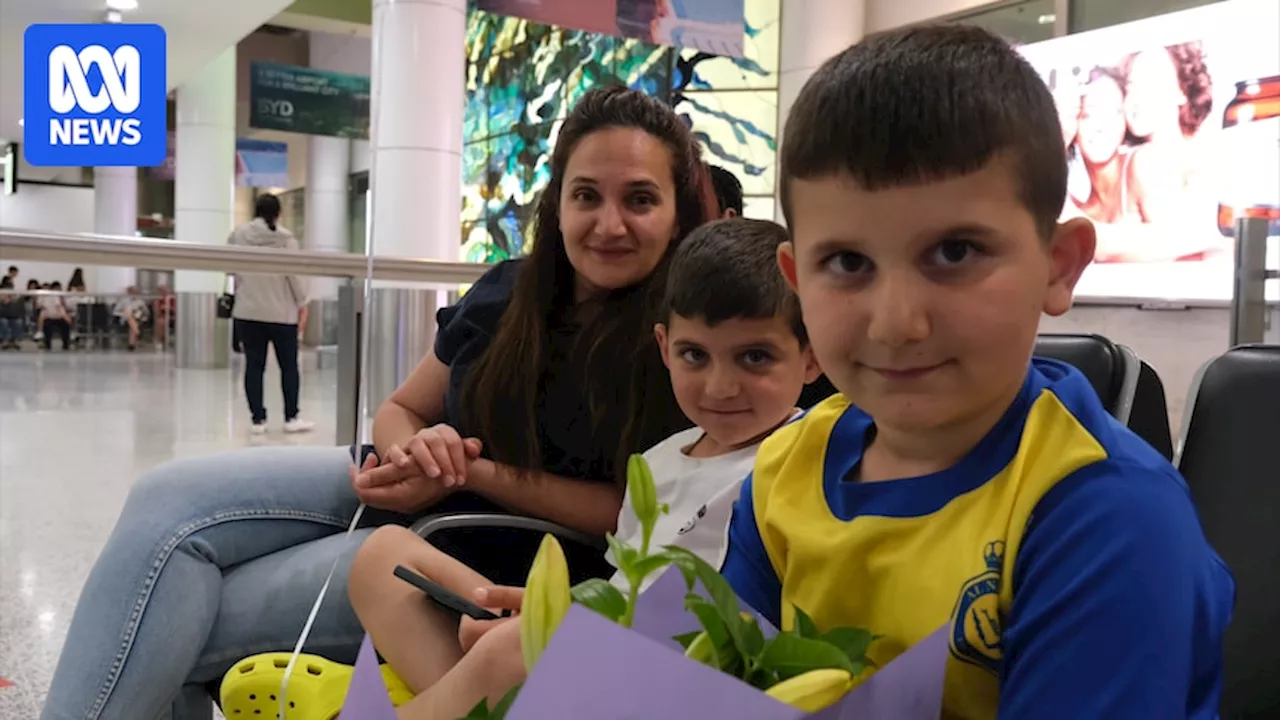 First flight carrying Australians and their families out of Lebanon touches down in Sydney