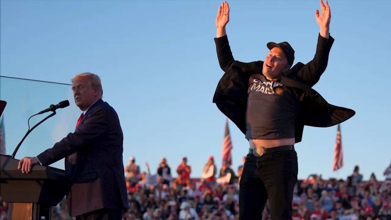 Elon Musk jumps around on stage as he joins Trump at rally