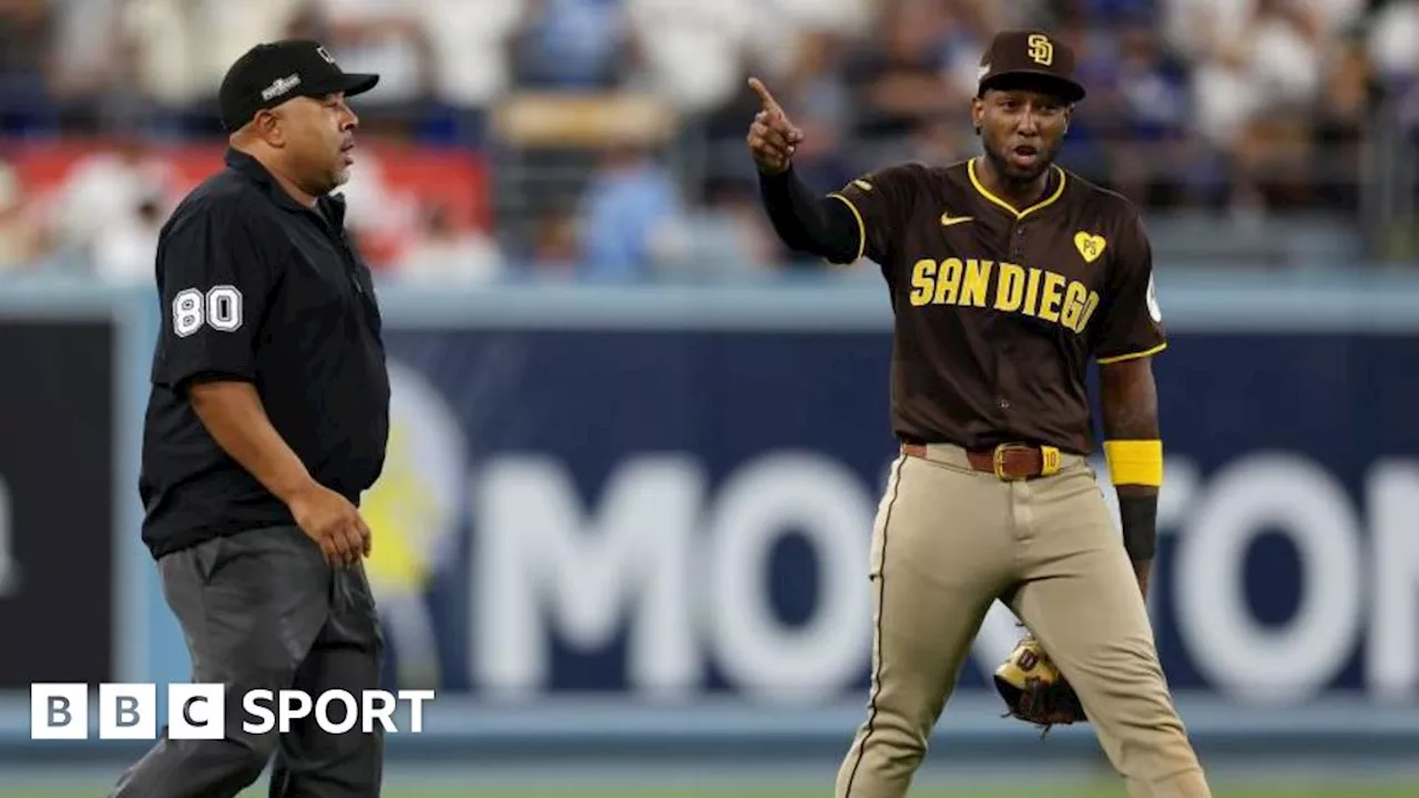 LA Dodgers-San Diego Padres game delayed after fans throw baseballs and beer at Jurickson Profar