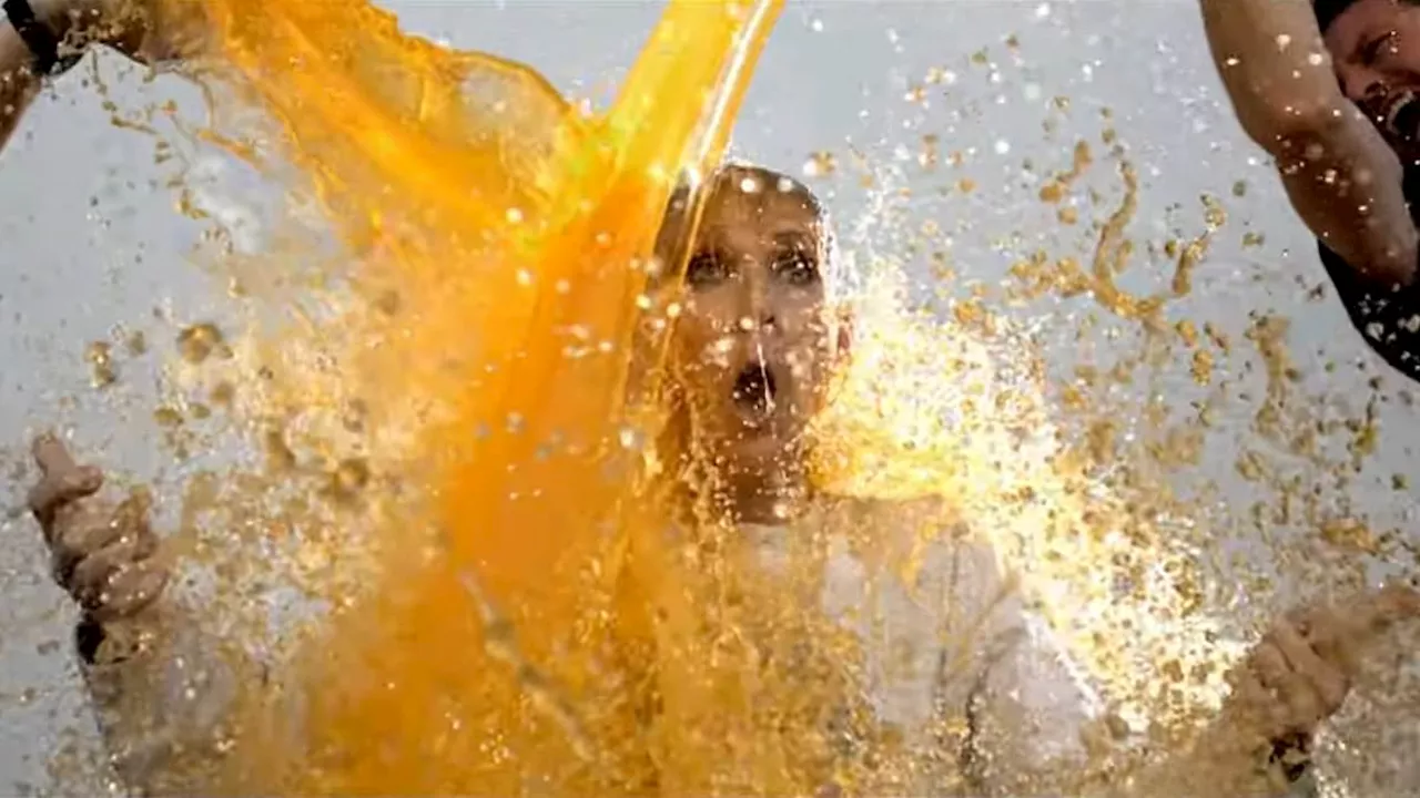 Celine Dion, 56, gets SOAKED with Gatorade during surprise Sunday Night Football intro appearance