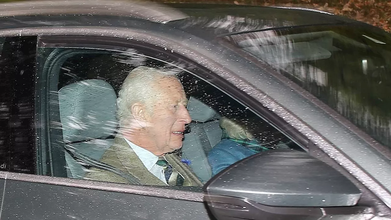 King Charles beams despite rainy weather as he and Queen Camilla drive to Crathie Kirk