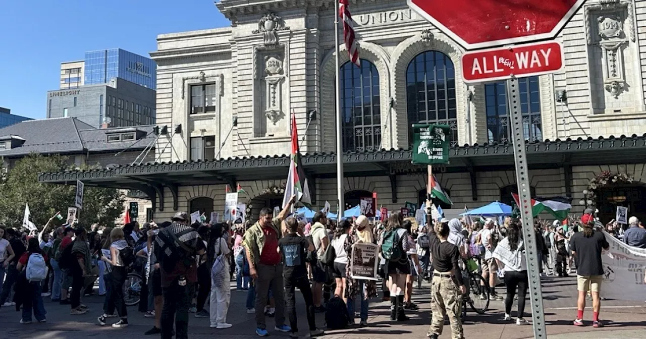 Pro-Palestine demonstrators march through downtown Denver to mark one year since start of Israel-Hamas War