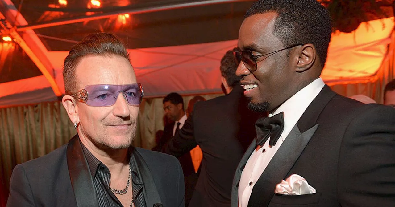 U2's Bono appears to dodge kiss from Sean 'Diddy' Combs in toe-curling footage