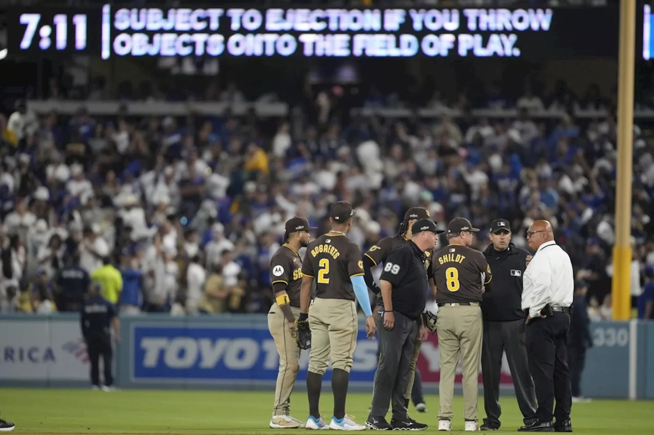 Dodger Stadium fans toss balls, trash on field, interrupt Padres' 10-2 win
