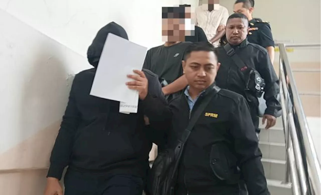 Immigration officer claims trial to 10 counts of graft involving over RM55,000