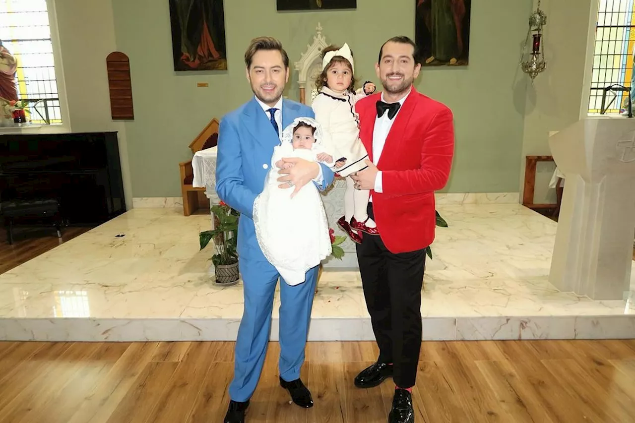 Brian Dowling and Arthur Gourounlian celebrate Blu's christening