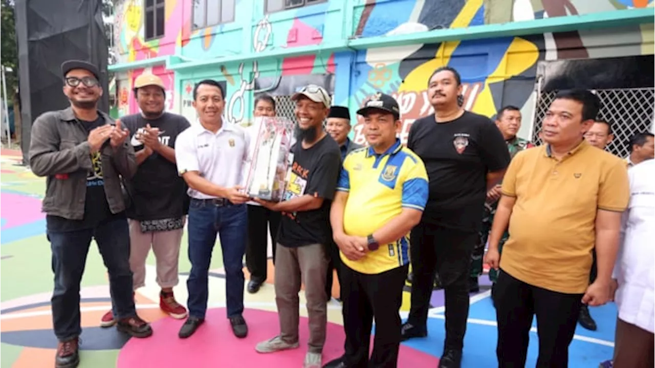 HUT TNI, Perbasi Persembahkan Mural Jenderal Ahmad Yani ke Dandim 0506/TGR