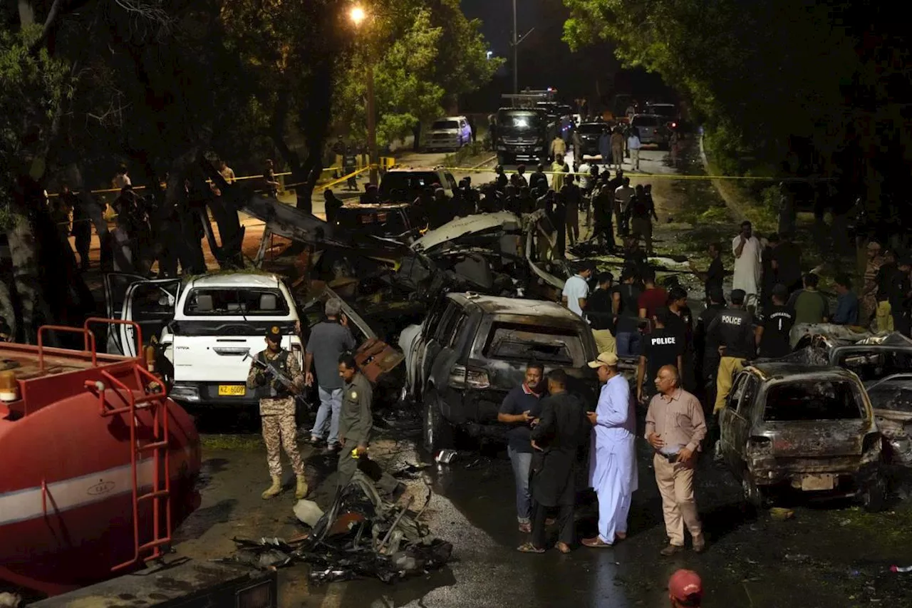 An explosion outside the Karachi, Pakistan, airport kills 2 workers from China and injures others