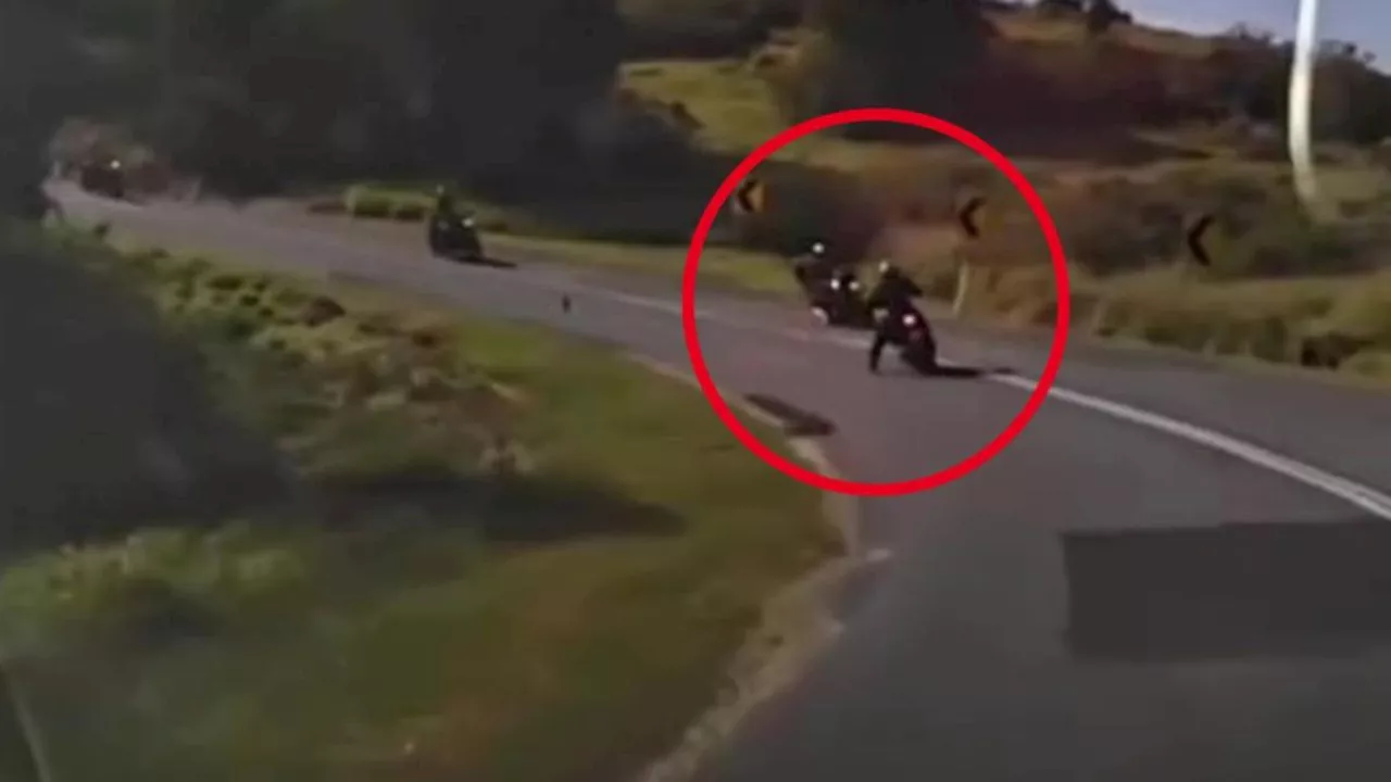 Motorcyclist filmed almost crashing into three other riders at Mount Mee, Queensland