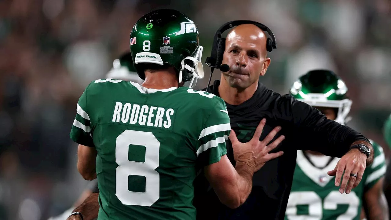 Coach sacked, security called in wild NFL scenes as big Rodgers question emerges