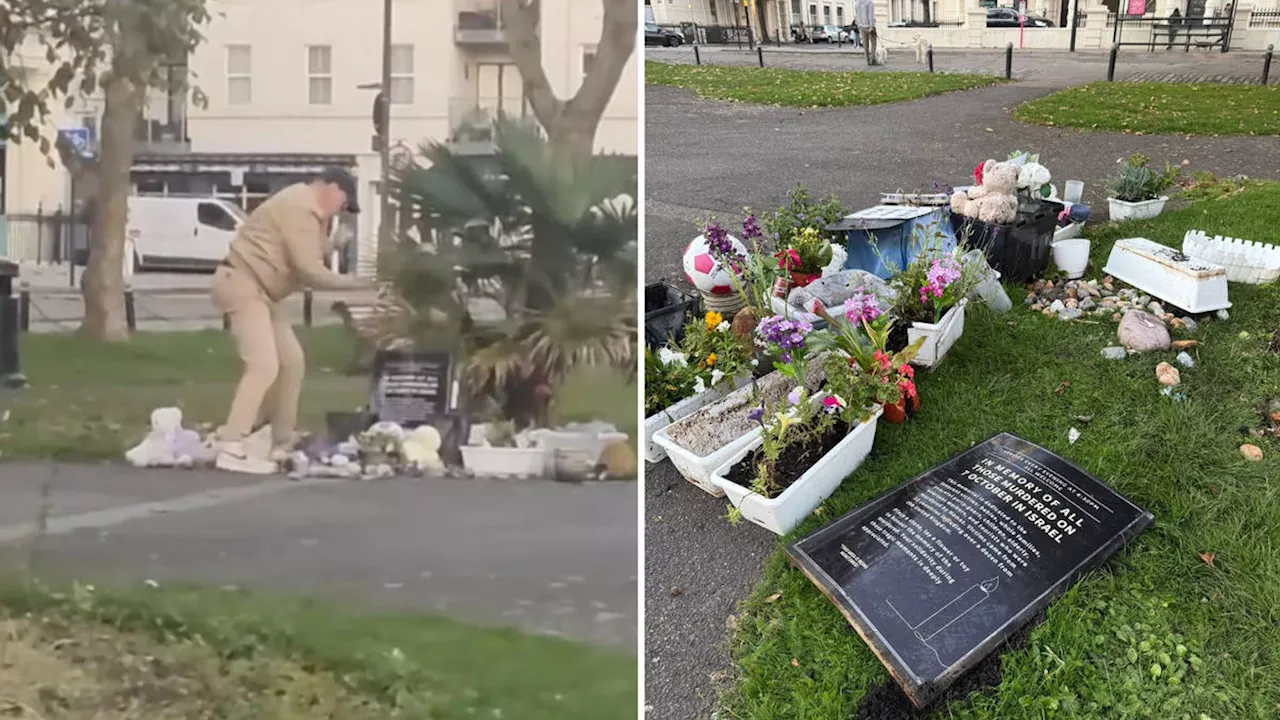 Man, 58, arrested following hate crime probe after footage shows 'evil' man destroying memorial to October...