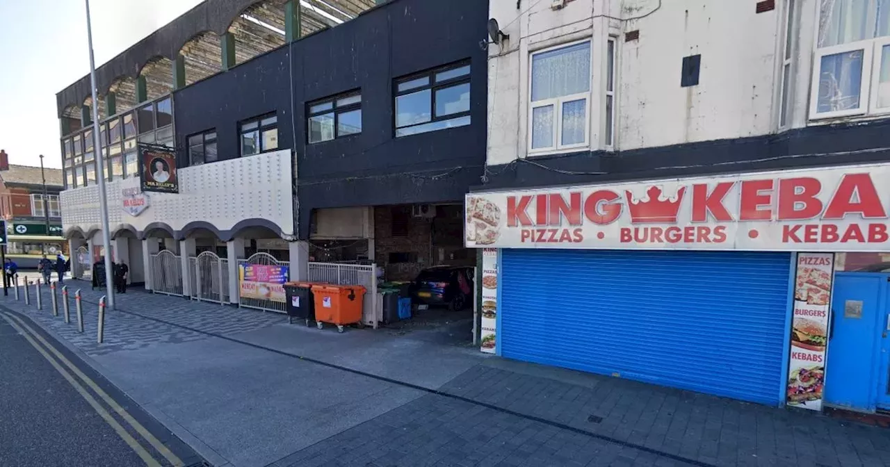 Man attacked with bottle outside takeaway as police cordon off road