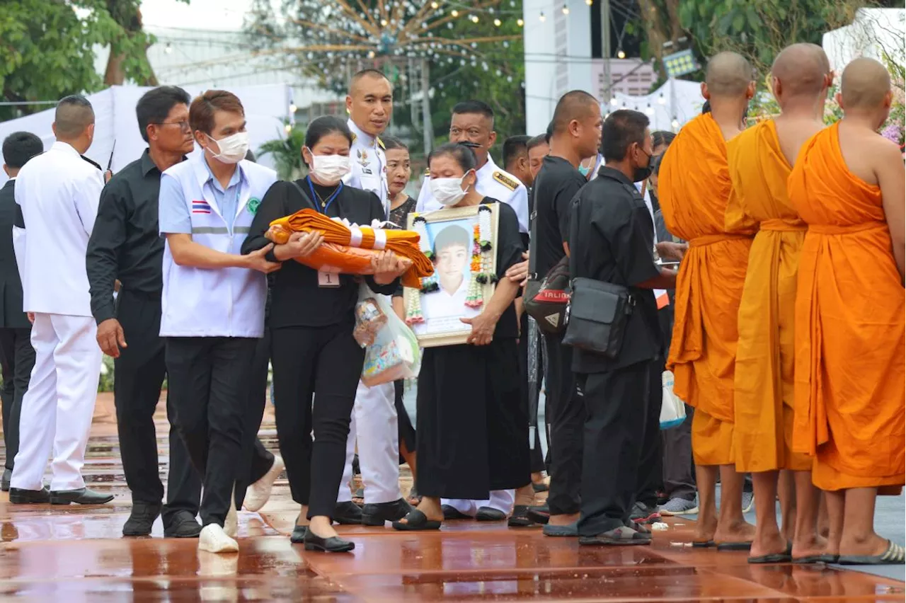 Sorrow and anger as small town in Thailand hold mass cremation for 23 who died in a school trip bus fire