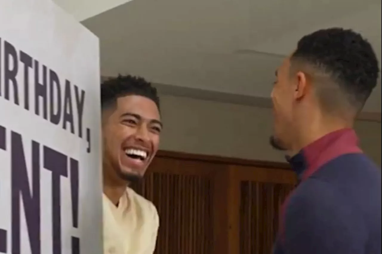 Jude Bellingham giggles and hides as he gives teammate Trent Alexander-Arnold surprise birthday present...