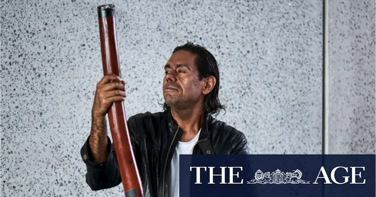 Magician of the didgeridoo conjures Mount Isa sunset