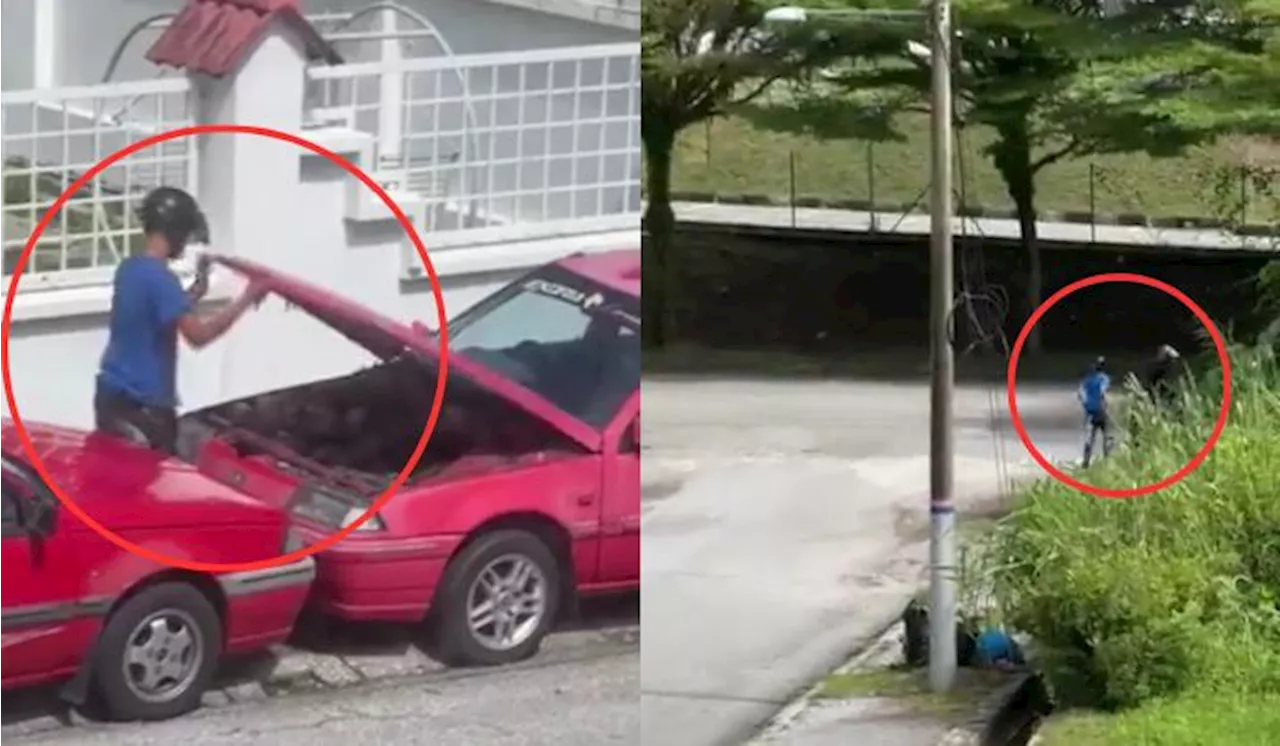 Viral Video Shows Man Allegedly Trying To Steal Car Battery In Broad Daylight In Ipoh