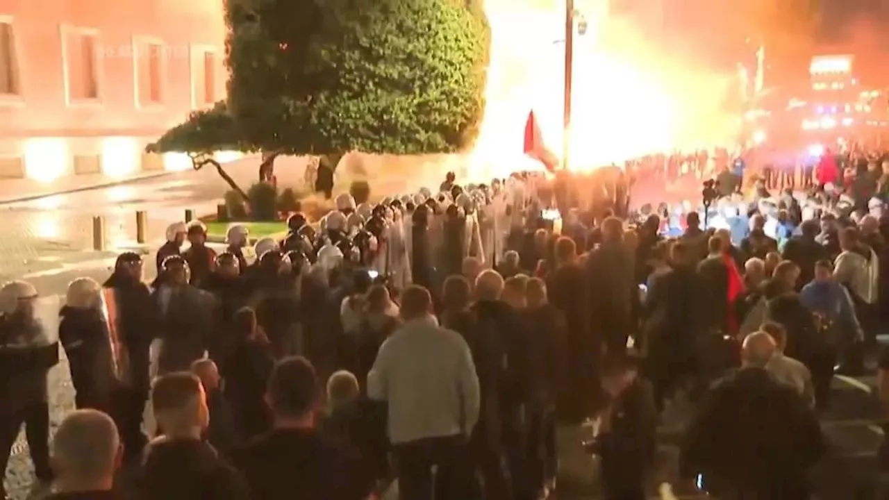 Albania's opposition supporters demand a caretaker Cabinet, clash with police at protest