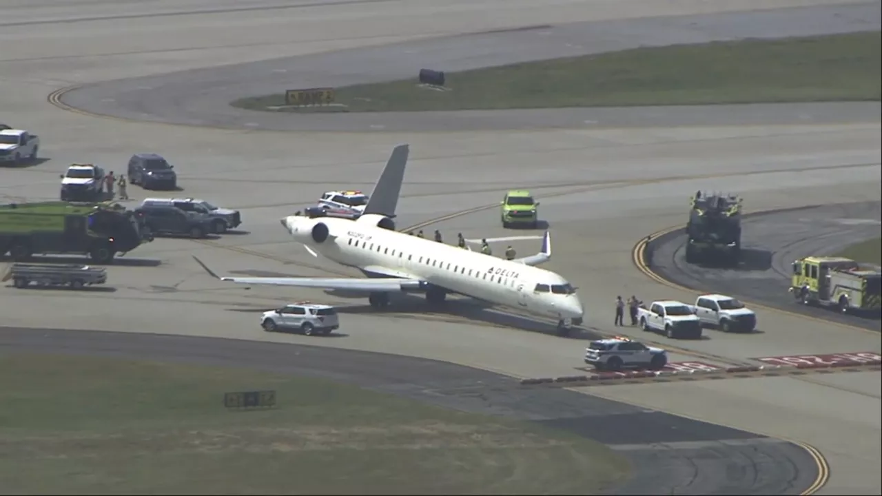 Pilot of larger plane was looking away from smaller plane in Atlanta airport mishap, report says