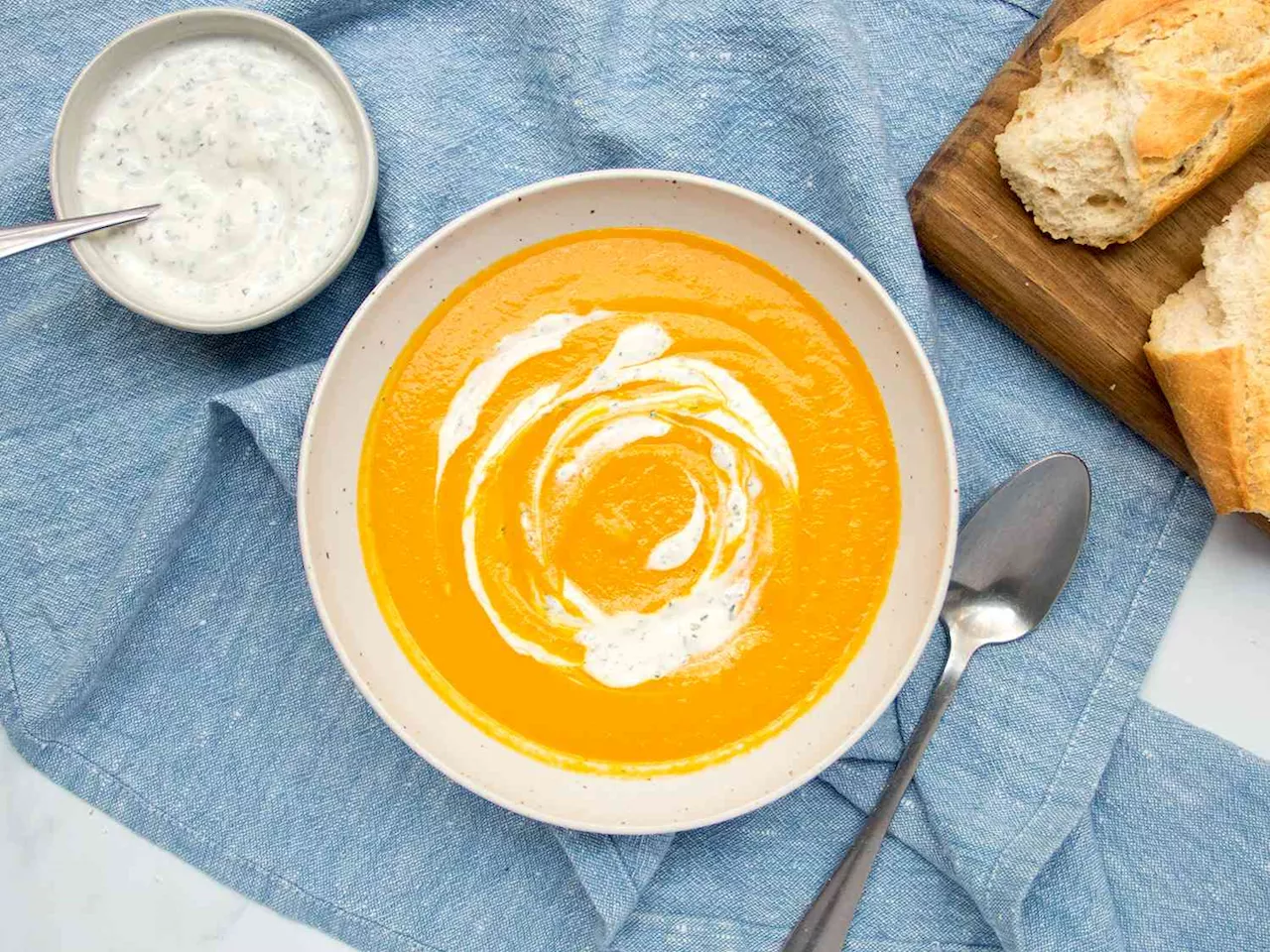 Creamy Roasted Carrot Soup With Lemon-Herb Yogurt Garnish