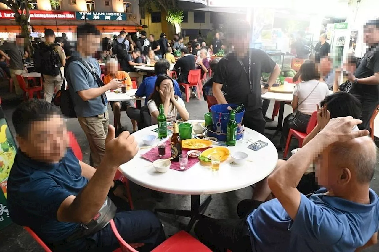 33 women arrested in anti-vice operation at Geylang coffee shop while men continued drinking