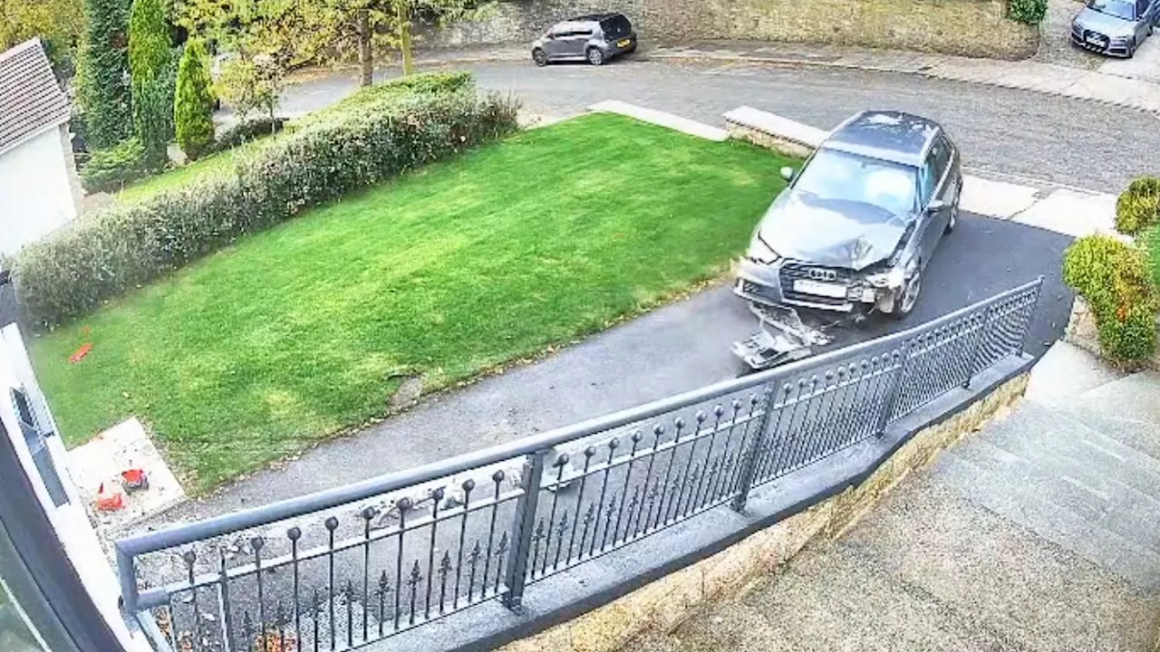 Shock moment car smashes HEAD ON into family home in botched U-turn on driveway...