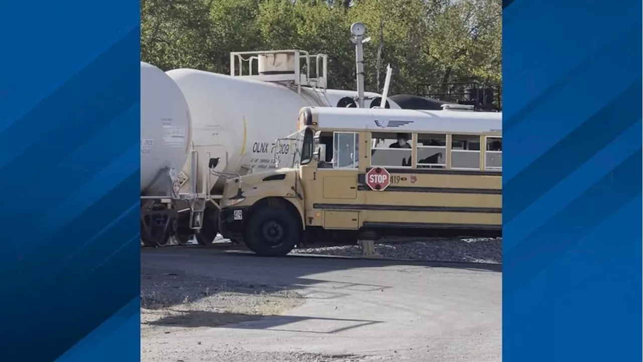 Video shows close encounter between Columbus City Schools bus, train at railroad tracks