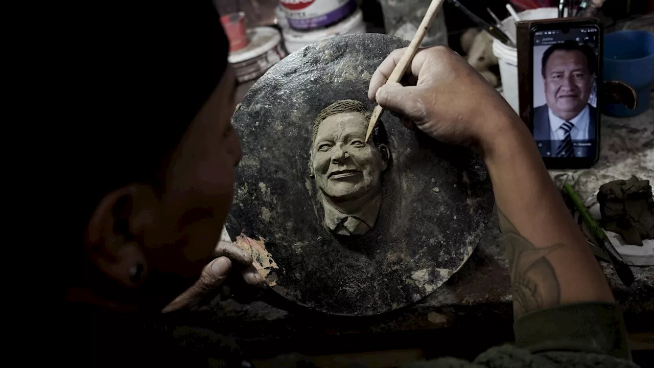 A Bolivian artist carves faces of the departed onto Day of the Dead bread