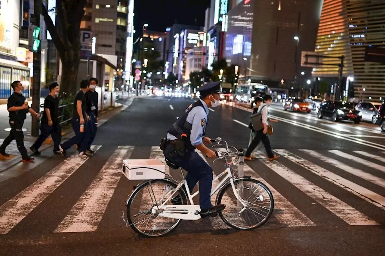 Japan cyclists risk jail for using a mobile