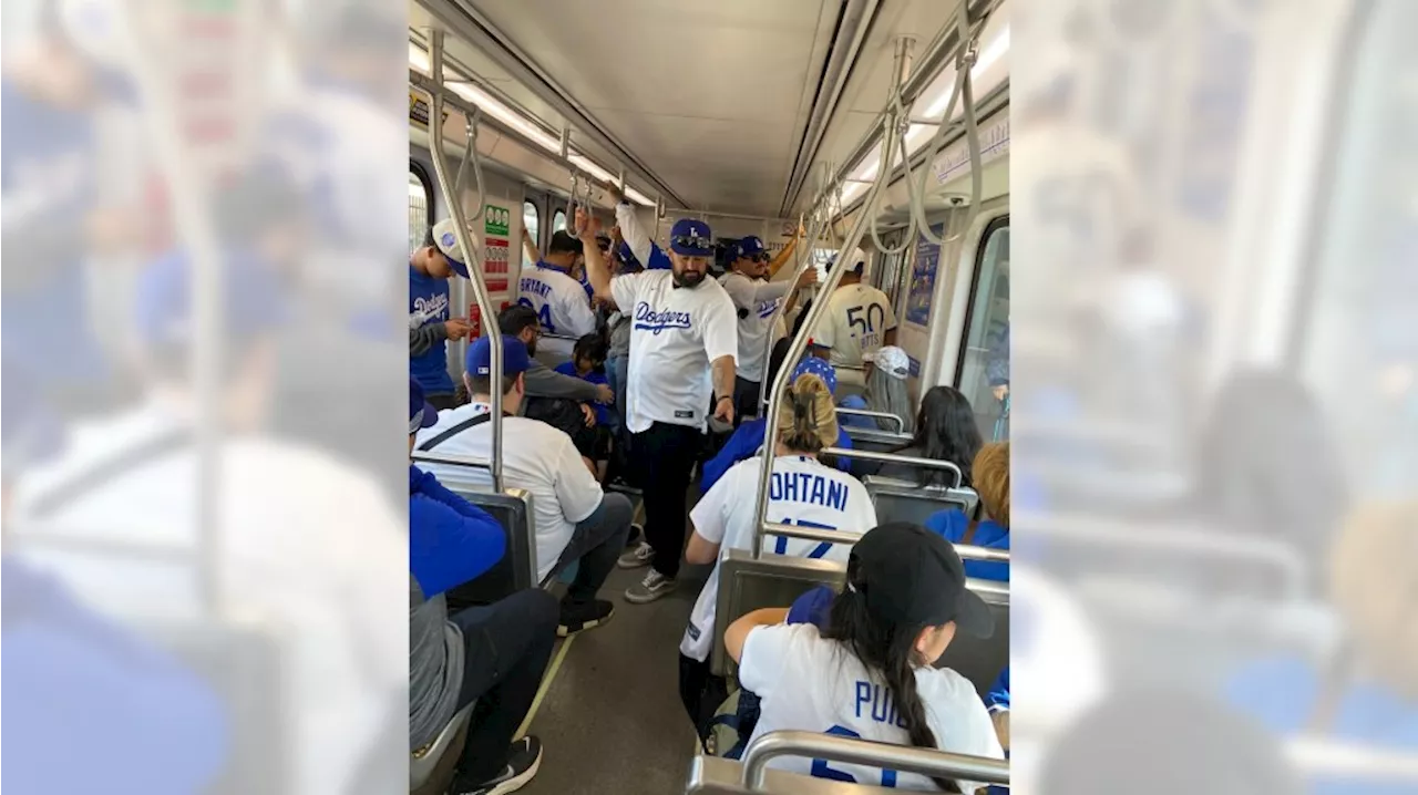 Metro trains and buses fill up for Dodgers celebration — and the rides are full but smooth