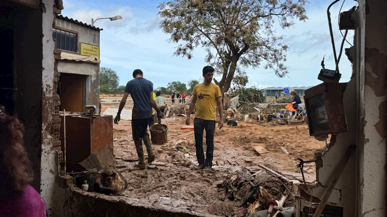 Family left with nothing forced to salvage precious memories after home devastated by Spain floods