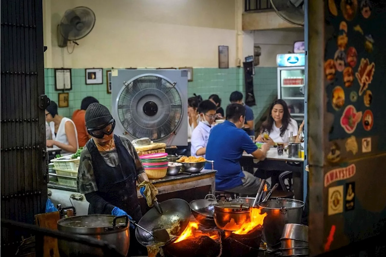 Bangkok’s Michelin-starred cook Jay Fai not retiring yet, will keep making signature crab omelette