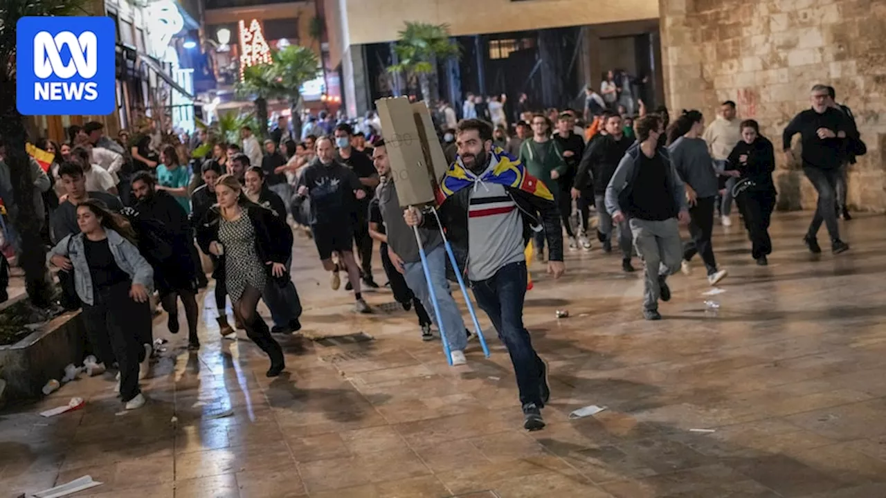 Valencia protesters clash with police as Spaniards demand leader's resignation over flood response