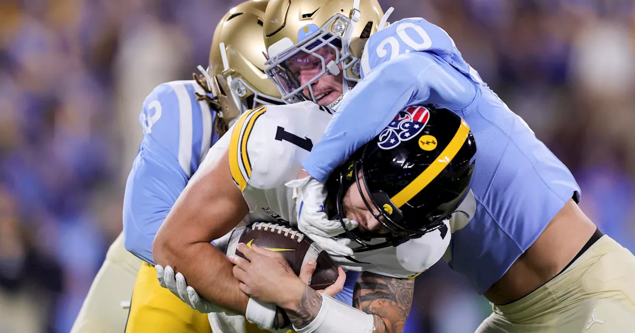 Garbers, Schwesinger lead UCLA past Iowa 20-17 for Bruins' 3rd straight win