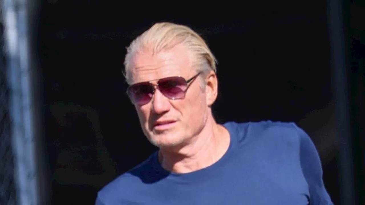 Dolph Lundgren, 67, and wife Emma Krokdal, 27, enjoy a beach day after hitting the gym together