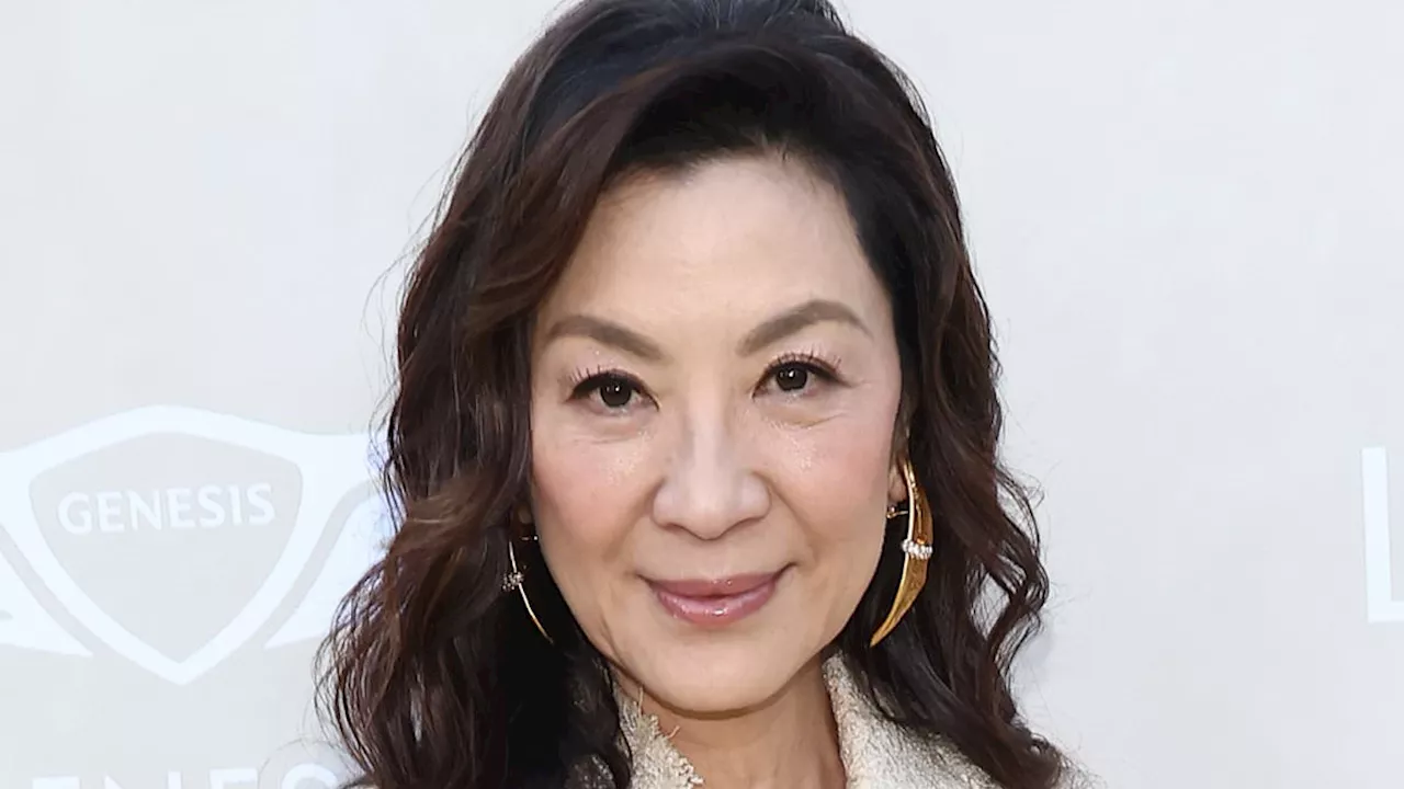 Michelle Yeoh, 62, debuts bold new look as she arrives at starry Wicked premiere in LA