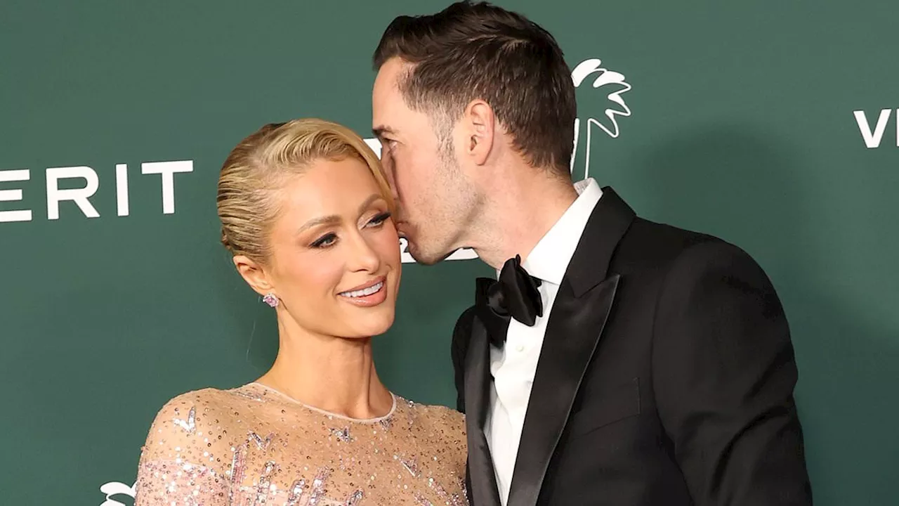 Paris Hilton gets kiss from husband Carter Reum at star-studded Baby2Baby gala