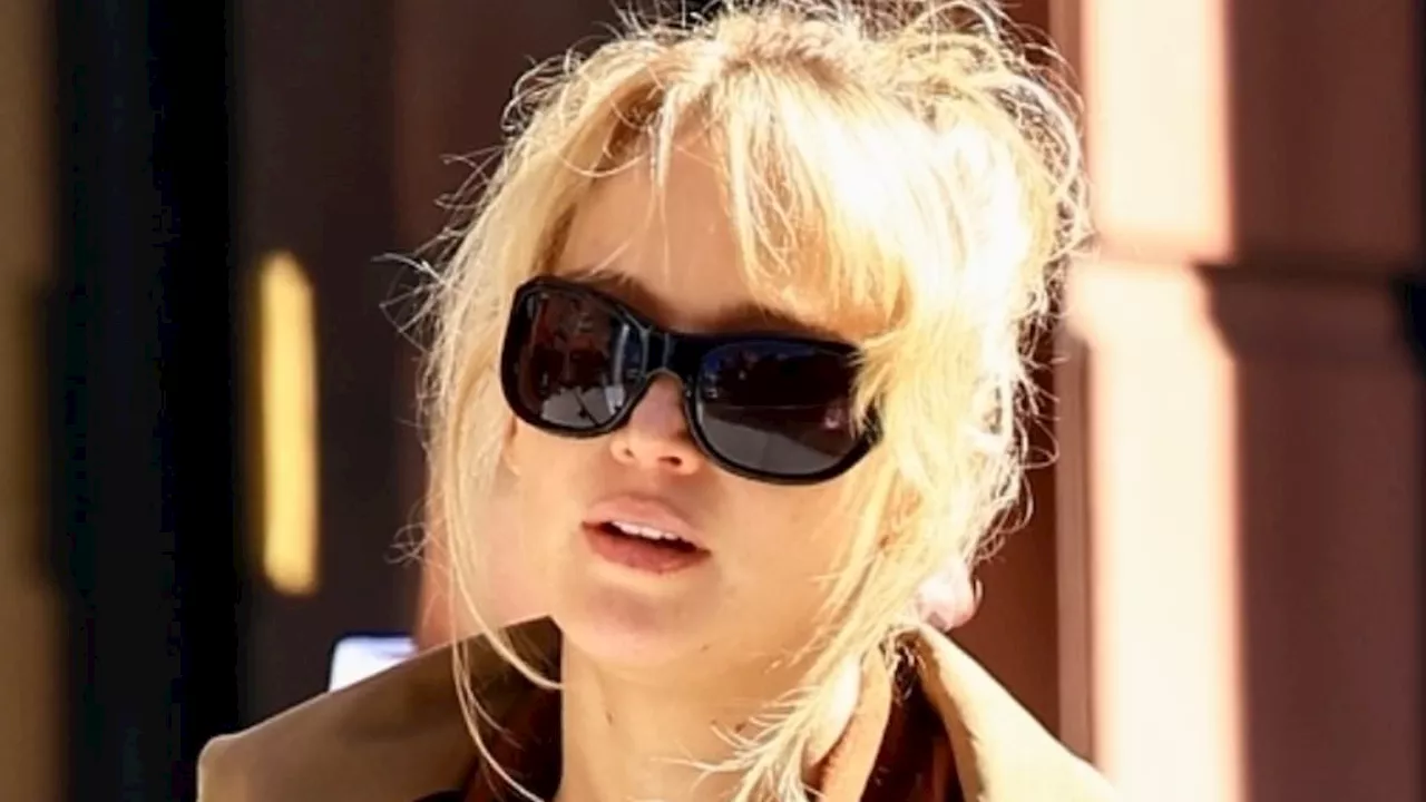 Pregnant Jennifer Lawrence bundles up for lunch with her son Cy, two, in LA