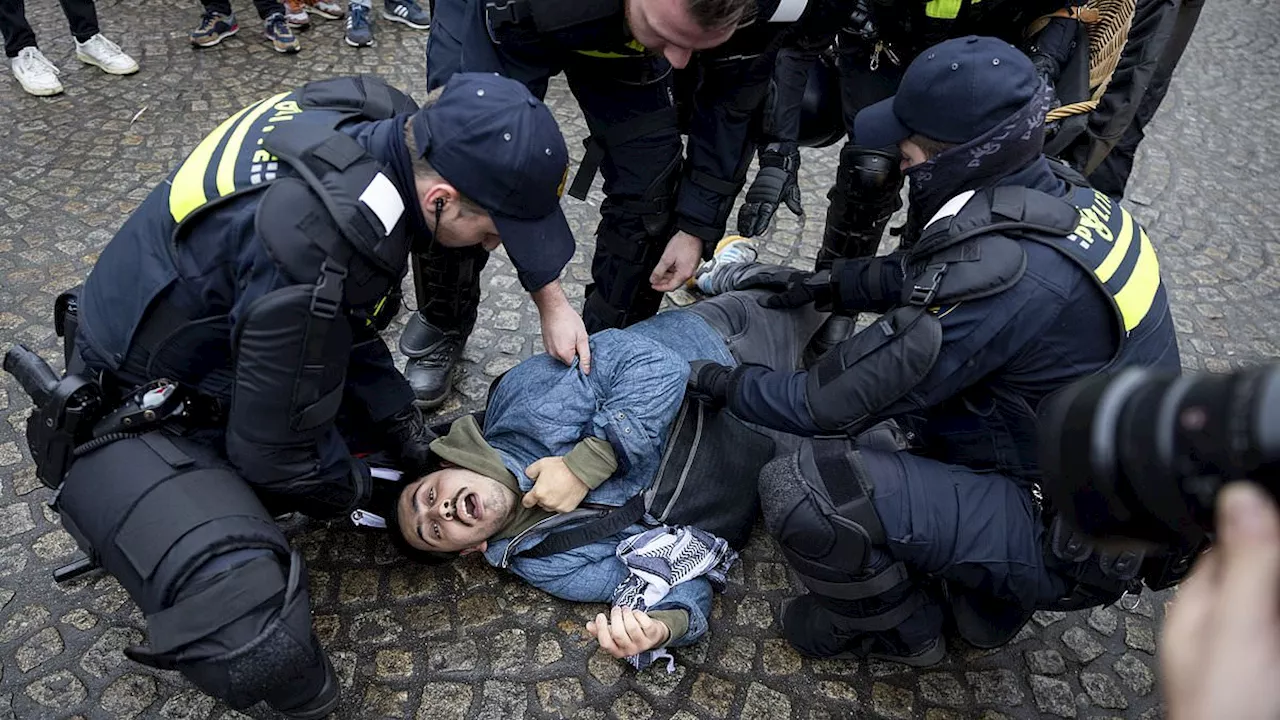 Chaos in Amsterdam as pro-Palestine protesters clash with Dutch police after officers move in on...