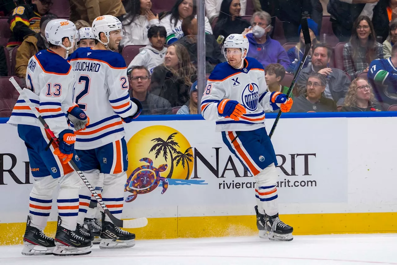 Oilers score 4 goals in third period to pull away from Canucks