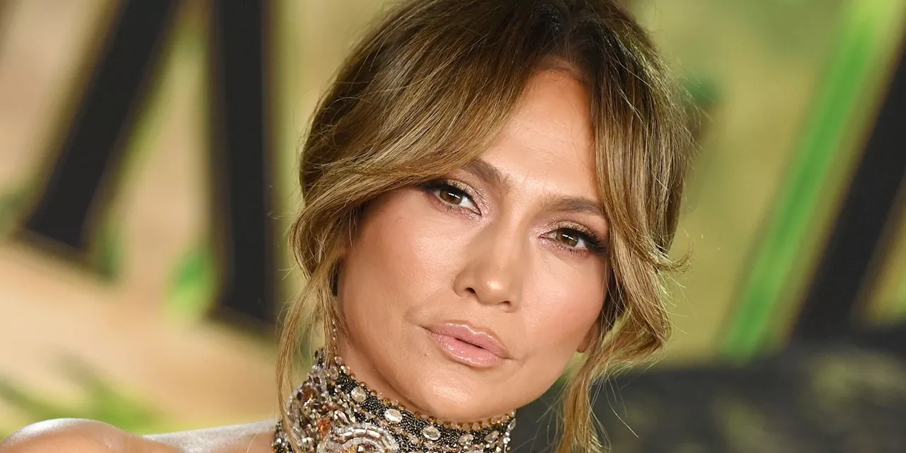 Jennifer Lopez Wore a Backless Halter Dress with a Thigh-High Slit to 'Wicked'