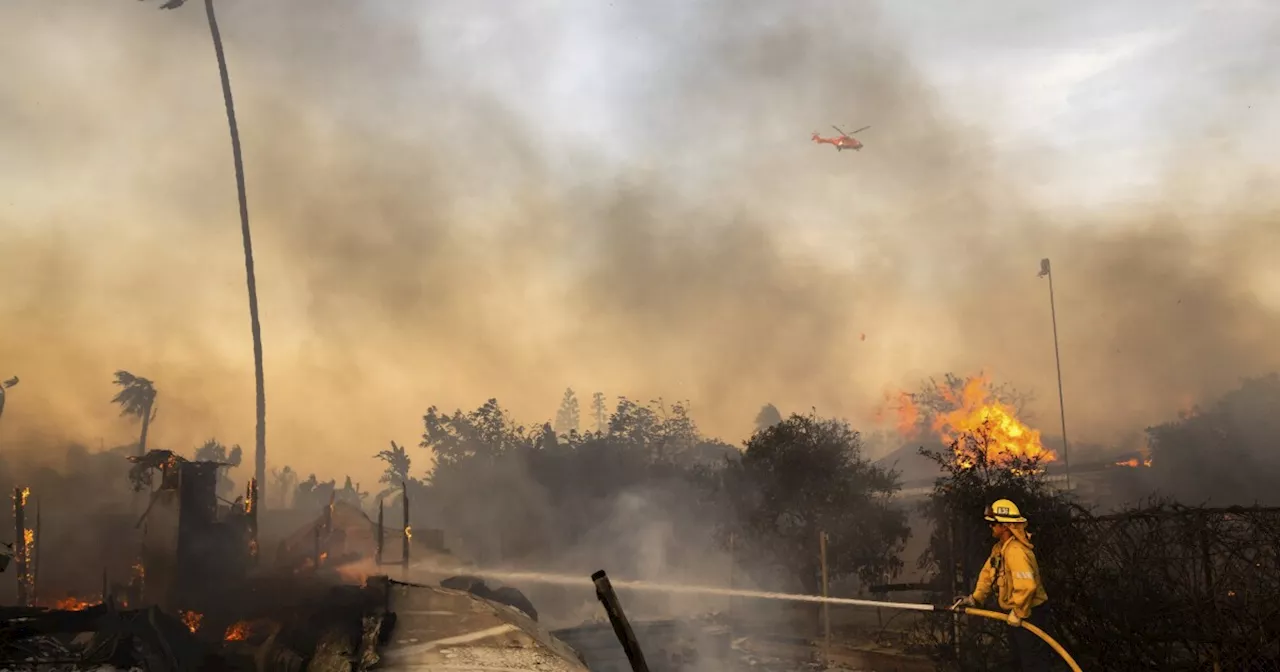 Slower winds aid firefighters battling destructive blaze in Southern California