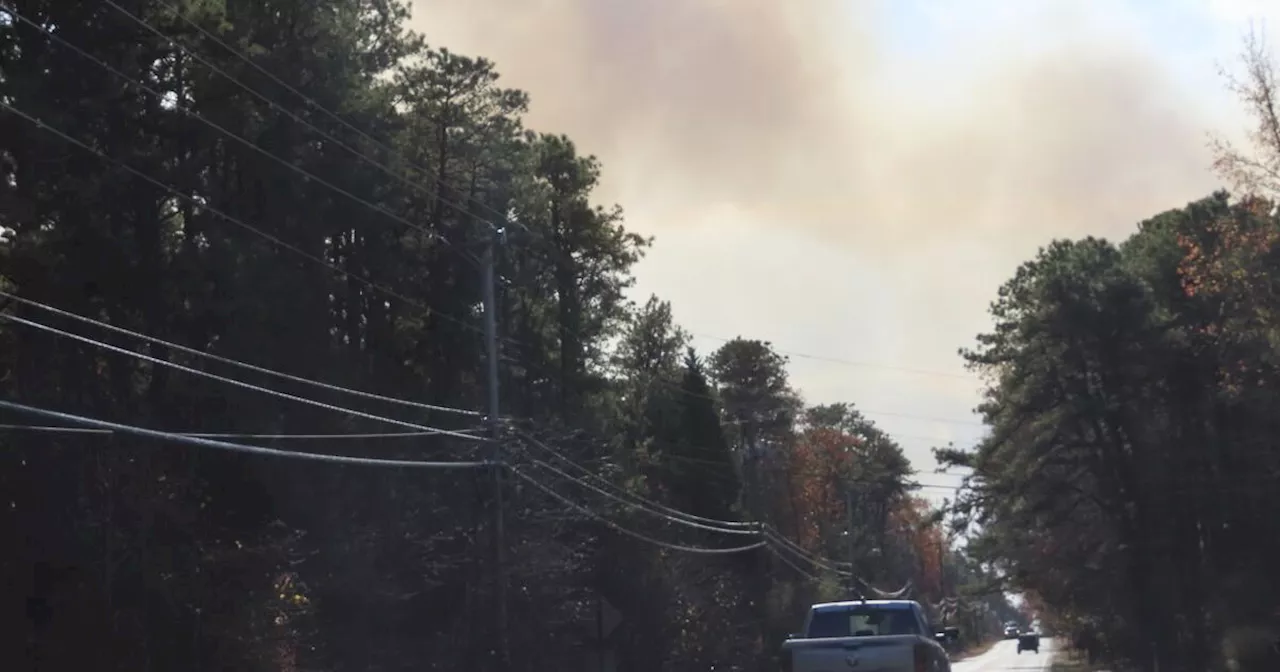 New York parks employee dies fighting fires as air quality warnings issued there and New Jersey